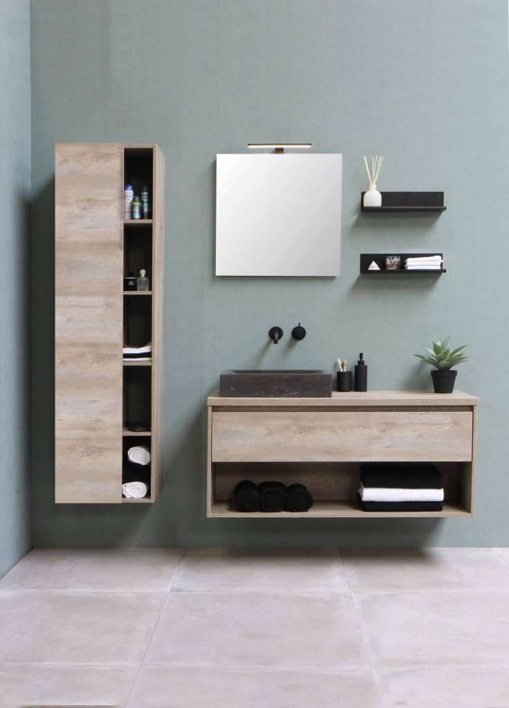 a grey bathroom interior with a brown wooden wall-mounted cabinet
